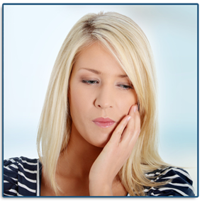 Woman in pain needing an emergency dentist